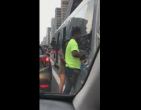 Girl dress lean beside black bus street