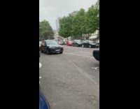 Guy blue vintage convertible car valet lot 