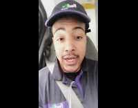 Purple black fedex uniform guy raps seatbelt 