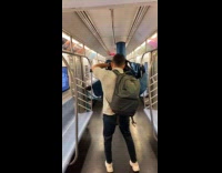 Drag queen takes photoshoot inside the train