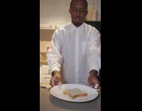 Guy acts like contestant on cooking show 