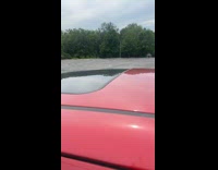 Red car with speakers and loud music