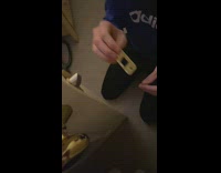 Guy trying to fix half broken door 