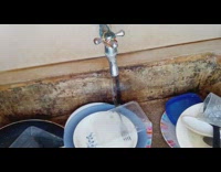 Guy beatboxes to dripping water sink faucet