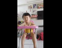 Collab VIBES - toddler in pink high chair falling asleep