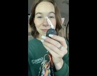Woman shows her broken key and struggles to try and start her car