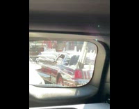 Passing limousine on the street with steampunk designs