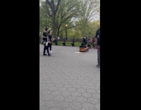 Band plays music woman dance with kid
