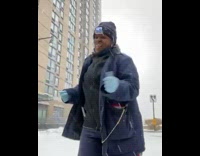Collab WINY - USPS driver dances outside in snow 