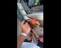 Man using jumper cables as jump rope