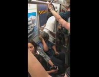 Collab Subway Creatures - Old man holds and lights up incense stick standing next to subway train doors