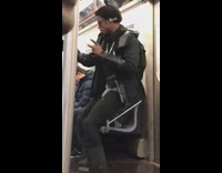 Guy sings Shape of You on karaoke microphone on subway train