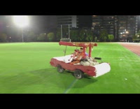 Flintstones car drove around track and field