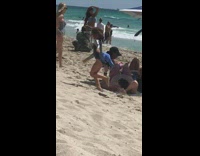 Girl blue bikini hold head pose beach