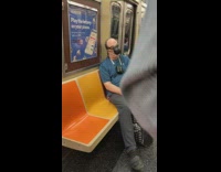 Guy wears black plastic face mask and goggles 