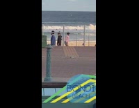 Guy pink shirt bondi beach tiktok dance