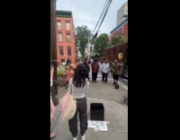 Quartet sings happy birthday to woman 