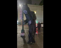 Person dressed as giant version of death