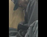 Guy sleeping black hat long booger mucus dripping out nose