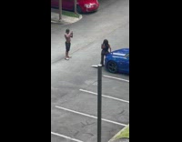 Woman transparent pants sit on blue car