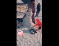 Kids build snowman then beat it up