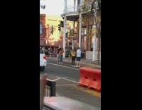 Family throw dried leaves photo shoot road