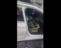 Burnt car on street destroyed