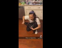 Man barks at dog to scare it to be quiet 