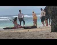 Girls in bikinis guys in suits