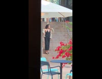 Woman black dress gray jacket walk stairs Part 1