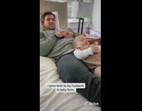 Baby lays back on bed like dad 