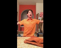 Kid sings Ariana Grande song