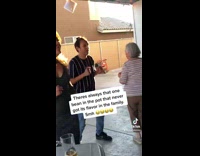 Guy dances off beat family party backyard 