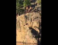 Guy backflips rock slaps water with back 