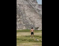 Muscular guy poses alone in front of Pyramid of the Moon