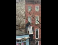 Guys climb over balcony with couch pt. 2