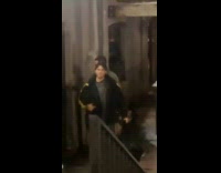 Woman dragging king sign