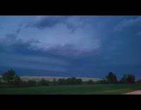Submitter shows flickering of lightning behind storm clouds