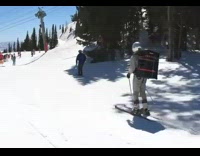 Man Skis with Black Box on Back 