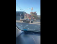 Man rides tall bike on the road