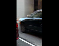 Man red pants do push ups on road