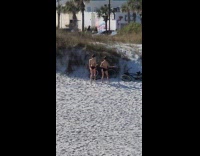 Twins in bikini tiktok dance at beach