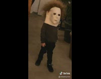 Little kid with michael meyers mask on