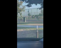 Two women tiktok dance sync tennis court