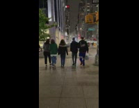 Group of people walking on street