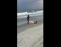 Woman crop top lie down the beach