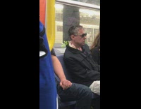 Man sit train plant stem in jacket