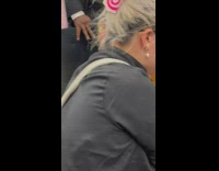 Woman with her dog and bird inside train and travels