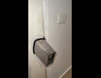 Woman puts cheese grater on door so she wont forget 