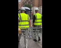 Men puts poster on closed down shop window